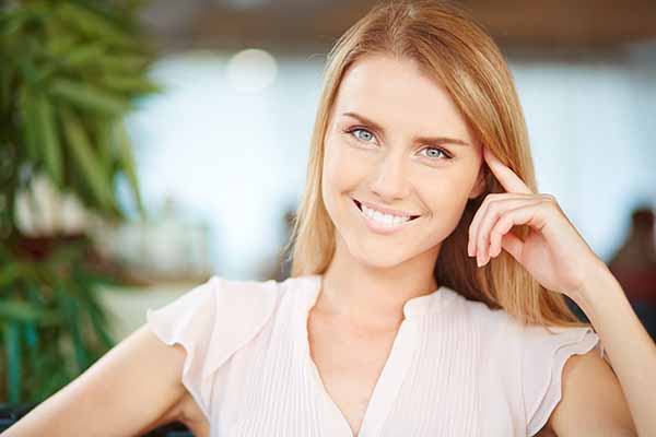 Smiling woman with braces